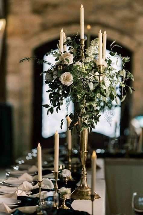 Table setting ideas with lighting Tall Gold Vases Centerpiece Wedding, Tall And Short Candle Centerpieces, Victorian Flower Arrangements, Candelabra Wedding Ceremony, Candelabra With Flowers, White Wedding Tablescape, Victorian Themed Wedding, Candlestick Centerpiece Wedding, Victorian Wedding Themes