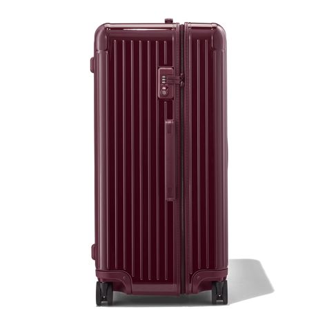 Designed with a distinctive shape inspired by our original trunks, the RIMOWA Essential Trunk Plus in berry purple is built to offer travellers optimum capacity. A timeless classic luxuriously engineered with long-lasting performance in mind, this design icon is the unmistakable mark of a seasoned traveller. Oversized, yet still ultra-lightweight, this extra large 4 wheel suitcase is the ideal extra spacious check-in bag for journeys of 2 weeks or more. Includes a complimentary leather luggage t How To Mark Your Luggage Suitcases, Extra Large Suitcase, Purple Suitcase, Red Suitcase, Olympic Airlines, Luxury Suitcase, Rimowa Essential, Rimowa Luggage, Air Transat