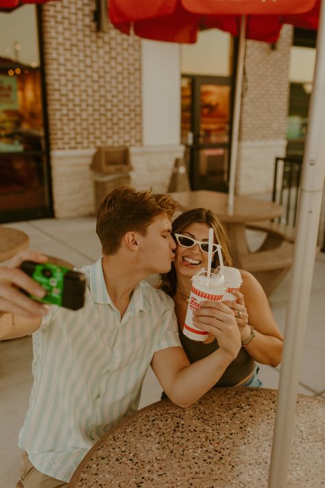 Icecream couples photoshoot ideas Diner Couples Photoshoot, Ice Cream Shop Photo Shoot Couple, Bakery Engagement Photos, Ice Cream Photoshoot Couple, In And Out Photoshoot, Couples Ice Cream Photoshoot, Ice Cream Date Photoshoot, Ice Cream Couple Photoshoot, Coronado Photoshoot