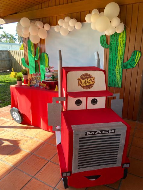Outdoor Cars Birthday Party, Trunk Or Treat Ideas Lightning Mcqueen, Mac Truck From Cars, Lightning Mcqueen Birthday Party Decor, Cars Disney Birthday Party Decorations, Cars Disney Party Ideas, Diy Cars Birthday Party, Cars Birthday Party Backdrop, Cars Mack Truck Diy