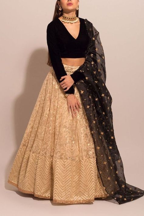 👉 Send Your Contact Number It is Needed for Ship Item 👌The lehenga choli is beautified with amazing multi thread embroidery Work indian wedding lehenga choli. Lehenga(Semi-Stitch) Lehenga Fabric :Net  Lehenga work : Embroidered  Waist  : SUPPORTED UP TO 42 Length :- 41 Flair : 2.75 meter  Inner : Satin  Lehenga Closer : Drawstring  Dupatta Dupatta fabric : Net Dupatta Work : Embroidered Lace Border With Pearl Lace Border  Dupatta length : 2.3 Meter Blouse(Stitch) Blouse : Mulberry (Fully stitc Black And Gold Lehenga, Black Lehenga Choli, Orang India, Gold Lehenga, Black Lehenga, Sabyasachi Lehenga, Indian Outfits Lehenga, Lehnga Dress, Bollywood Lehenga