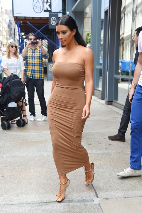 Kim's tan glows against this tanned-hued spandex dress.   - MarieClaire.com Kim Kardashian Wedding, Fall Color Trend, Kardashian Makeup, Kim Kardashian Makeup, Kim Kardashian Hair, Gala Gowns, Nude Outfits, Kim Kardashian Outfits, Robert Kardashian