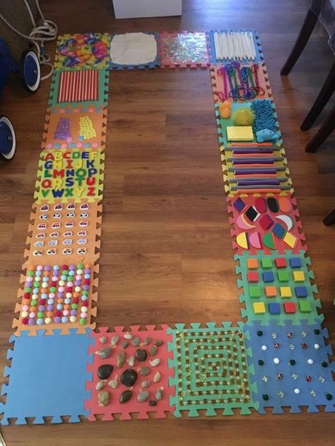 DIY sensory walk using foam puzzle tiles Sensory Walk, Maluchy Montessori, Diy Sensory, Sensory Wall, Aktiviti Kanak-kanak, Sensory Rooms, Baby Sensory Play, Toddler Sensory, Sensory Boards