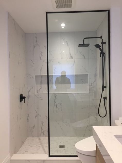 Black Shower Small Bathroom, Black Bathroom Shower Door, Shower Glass With Black Frame, Black Shower Doors Frame, Shower Hardware Black, Single Shower Panel, Contemporary Shower Design, Condo Shower Ideas, Half Panel Shower Door