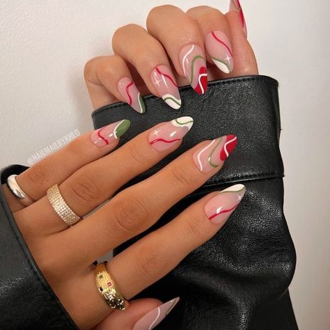 Christmas Nail Designs Cute, Short Almond Nails Christmas Designs, Short Stiletto Christmas Nails, Christmas Abstract Nails, Holiday Nails Inspiration, Christmas Nails 2023 Almond, Abstract Christmas Nails, Christmas Swirl Nails, Summer Christmas Nails