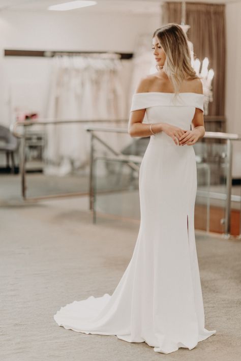 Francine will soon be arriving at the Yes Bridal Studio in Matlock, Derbyshire.  She is an elegant stylish dress with the beautiful v back and Bardot neckline / off the shoulder, available to try on from September 2020, why not book your appointment now?! Minimalist Simple Wedding Dress, Haute Couture, Satin Wedding Dress Minimalist, Structured Simple Wedding Dress, Crepe Bridal Dress, Wedding Gowns Simple Elegant, Elegantwedding Dress, Simple Wedding Dress With Buttons, Bardot Neckline Wedding Dress
