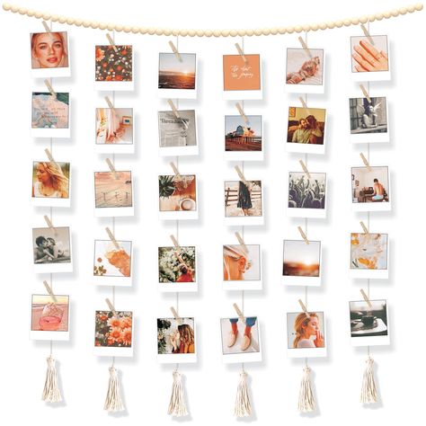 PRICES MAY VARY. Hanging photo display with clips - Hang your favorite photo and memories in bohemian style. This is the latest photo holder for wall trend of how to hangit your instax photos, polaroid pictures, artworks, greeting cards, postcards. This product is very popular as boho room decor for teen picture wall Wall photo will definitely fit on your boho dorm wall. This multi hanging photo display wall decor collage will fit any wall. Size 45 x 45 inch. Perfect to place on any blank wall o Photo Chain Wall, Ways To Hang Polaroids, Hanging Polaroids, Bohemian Girls Bedroom, Polaroid Pictures Display, Wall Boho Decor, Dorm Room Pictures, Picture Frames Collage, Hanging Photo Display