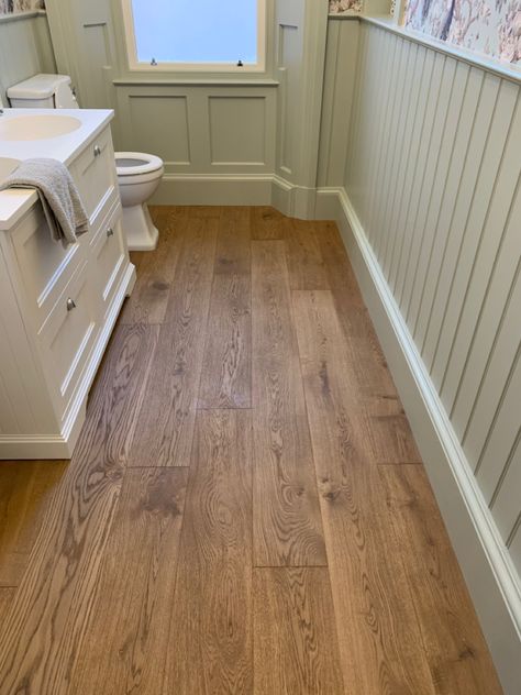 Engineered oak wood flooring in bathroom Wooden Flooring In Bathroom, Bathroom Flooring Wood Look, Cottage Bathroom Wooden Floor, Oak Flooring Bathroom, Wooden Effect Floor Tiles, Wooden Bathroom Flooring, Rich Wood Floors, Wooden Floors In Bathroom, Natural Wood Floor Bathroom