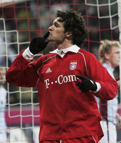 MUNICH, GERMANY - DECEMBER 11: Michael Ballack of Bayern Munich celebrates scoring during the Bundesliga match between Bayern Munich and FC Kaiserslautern at the Allianz Arena on December 11, 2005, in Munich, Germany. (Photo by Ben Radford/Getty Images). Fifa Mobile Card, Bayern Munich Players, Germany December, Fifa Card, Michael Ballack, Bayer Munich, Football Drawing, Fifa Mobile, Football Players Photos