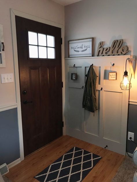 Behind Front Door Decor Small Spaces, Small Behind Door Entryway, Single Wide Entry Way, Space Behind Front Door Entryway, Front Door Opens To Stairs Entry Ways, Small Entryway Behind Front Door, Behind The Door Entryway Ideas, Behind Front Door Decor Entryway, Wall Behind Front Door