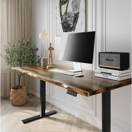 "Introducing UMBUZO's Express Ship Stand-Up Desk - Elevate Your Workspace in Just 1 Day! Transform your office with the UMBUZO Sit-Stand Desk  the epitome of sophistication for the dedicated professional. Meticulously crafted with a luxurious solid walnut surface and a precision motorized frame, this desk seamlessly marries elegance with dynamic functionality. Indulge in the unparalleled value of our standing desk  a premium investment in both comfort and productivity, all at an unmatched price.  Lifetime Quality Assurance  Sustainably Sourced Wood  Proudly US-Based Every piece possesses unique characteristics, ensuring an individualized, hand-finished furniture item that stands apart from mass-produced alternatives. For the first 100 units sold, enjoy an exclusive 70% discount on this mas Computer Desk On Wheels, Mid Century Modern Standing Desk, Home Office Decor Standing Desk, Two Standing Desk Office Layout, Standing Desk With Drawers, Standing Desk Home Office Design, Standup Desk Home Office Ideas, Live Edge Desk Office, Office With Standing Desk