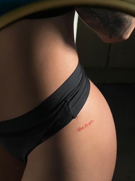 Red Ink Tattoos Aesthetic, My Body My Art Tattoo Text, Minimalist Tattoo Lower Back, 444 Hip Tattoo, Small Tattoos On Buttocks For Women, She Is Art Back Tattoo, Red Ink Hip Tattoo, Red Ink Name Tattoo, Small Red Ink Tattoos For Women