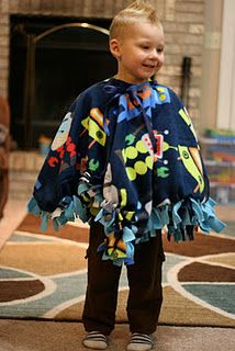 Today's post if a "sewing" tutorial, of sorts. Only it doesn't actually involve sewing. And it was created by our good friend Megan from Ne... Couture, Ponchos, Poncho Diy, Carseat Poncho, Poncho Tutorial, Fleece Crafts, Fleece Projects, No Sew Fleece Blanket, Car Seat Poncho