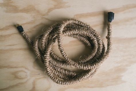 DIY Twine Covered Extension Cord | Remodelista Upcycling, Extension Cord Organization, Diy Cord Cover, Dc Penthouse, House Diys, Tv Cords, Twine Diy, Hiding Ugly, Hide Cords