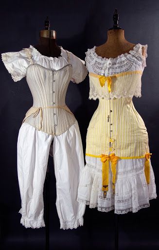 Left: grey cotton long line corset worn over one piece cami-knickers, and additional bustle pad tied around waist, c. 1895. Right: Yellow and white striped... Art Gallery Museum, Edwardian Corsets, Victorian Era Fashion, Gallery Museum, 1910s Fashion, Frou Frou, Victorian Clothing, Edwardian Fashion, Historical Costume