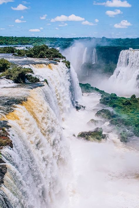 There's no doubt that Iguazu Falls is one of the most breathtaking sights in the world. It has even been named one of the New 7 Wonders of Nature. In this guide you'll find everything you need to know for visiting Iguazu Falls from the Brazilian side and planning a trip of a lifetime to these majestic waterfalls! Iguazu Cataratas | Iguazu Falls photography | Foz do Iguacu | Things to do in Iguazu Falls Brazil | South America bucket list | Brazil bucket list | Things to do in Brazil Argentina, Nature, Iguacu Falls Brazil, Brazil Bucket List, Brazil Waterfalls, Things To Do In Brazil, America Bucket List, Trip To Brazil, 7 Natural Wonders