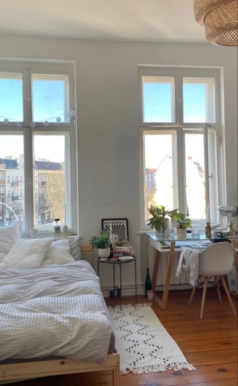 bright and clean minimalist bedroom in an old building with big windows Apartment Big Windows Aesthetic, Vacation Room Aesthetic, Aesthetic Simple Bedroom Ideas, Simple Bedroom Ideas For Big Rooms, Bright Aesthetic Room, Room Ideas Aesthetic Wood, Big Bedroom Inspirations, Bedroom Rectangle Layout, Swedish Bedroom Aesthetic