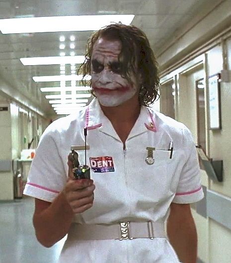 Joker Nurse  ... "Ou se morre como herói, ou vive-se o bastante para se tornar o vilão." Joker Nurse Costume, Heath Joker, Joker Ledger, Joker Nurse, Joker Dark Knight, Joker Photos, Nurse Dress Uniform, Der Joker, Joker Heath