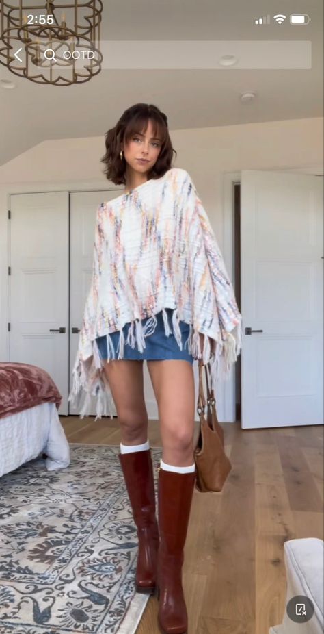 Brown Boots Mini Skirt, Outfit With Poncho, Outfits For Red Boots, Red Brown Boots Outfit, Long Skirt Chunky Sweater, Denim Skirt Tall Boots Outfit, Styling Poncho Outfit, Fall Tumblr Outfits, Knitted Poncho Outfit