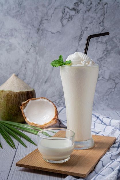 Young coconut juice smoothie in glass, f... | Premium Photo #Freepik #photo #coconut-shake #milkshake #shake #fruit-shake Fresco, Coconut Milkshake, Smoothie Glass, Coconut Juice, Ice Cream Smoothie, Coconut Milk Smoothie, I Am Very Sorry, Mumbai Street Food, Asian Tea