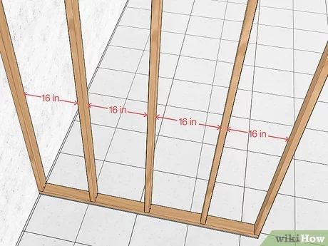 How to Build a Fake Wall: 12 Steps (with Pictures) - wikiHow How To Frame Out A Wall, Diy Dividing Wall, How To Build A False Wall, Frame A Wall Diy, How To Build A Stud Wall Diy, How To Put Up A Temporary Wall, Temporary Wall Panels, Build Fake Wall, Diy Stud Wall