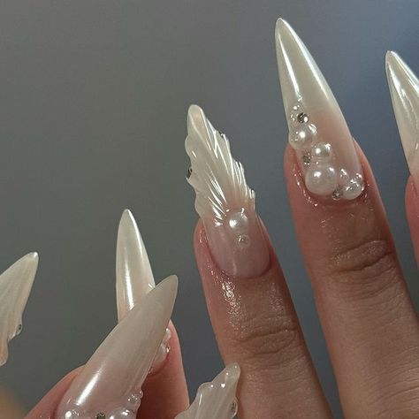 Amy | Gel X Educator & Mentor 🇨🇦 on Instagram: "pearl mania 🐚✨  #stilettonails #gelxnails #gelnailsdesign #pearlnails #pinterestnails #longnails #elegantnails #nails2inspire #chromenails" Crushed Pearl Nails, Pearl White Nail Designs, Short Almond Pearl Nails, Gel X Nail Inspiration, Gel X Nails Aesthetic, Blinged Out Almond Nails, Pearl Embellished Nails, Oyster Pearl Nails, Long Gel X Nail Ideas