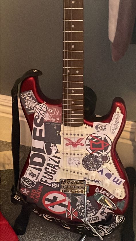 punk band stickers on guitar body Stickers On Guitar, Punk Visual Art, Punk Guitar, Punk Fashion Diy, Guitar Stickers, Rockstar Aesthetic, Electric Guitar Design, Guitar Obsession, Band Stickers