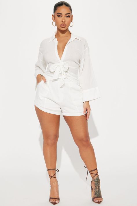 Available In Black, White, And Rust. Short Set Long Sleeve Collar Button Front Deep V Neck Shorts Elastic Waist Pockets Top- Self: 100% Cotton Bottom- Self: 100% Cotton Lining: 100% Rayon Imported | Kati Short Set in White size XL by Fashion Nova Womens Short Suit Set, Catalina Island Outfit Summer, All White Outfit Shorts, One Piece Outfit Jumpsuit Short, Blazer Romper, White Short Set, Stephanie Rao, Island Outfit, All White Outfit