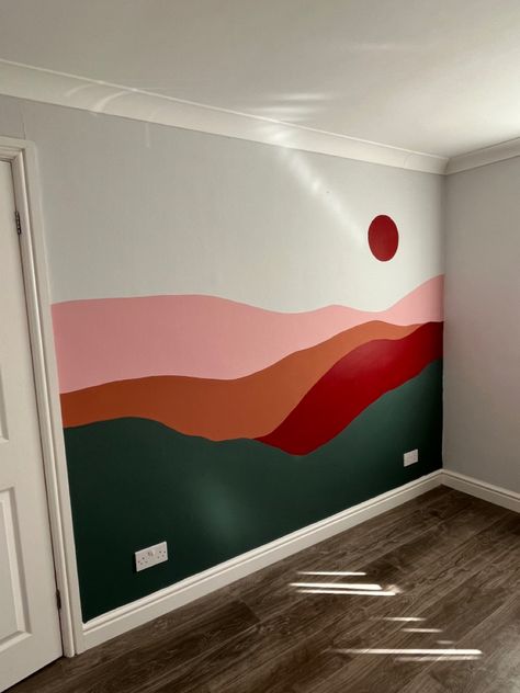 Bedroom feature wall mural of a sunset and mountains Sunset Bedroom Walls, Mountains Wall Paint, Simple Mountain Mural Nursery, Feature Wall Painting, Diy Feature Wall Paint Bedroom, Painted Mountain Wall Mural, Painted Mural Accent Wall, Calming Mural Ideas, Wall Murals For Home
