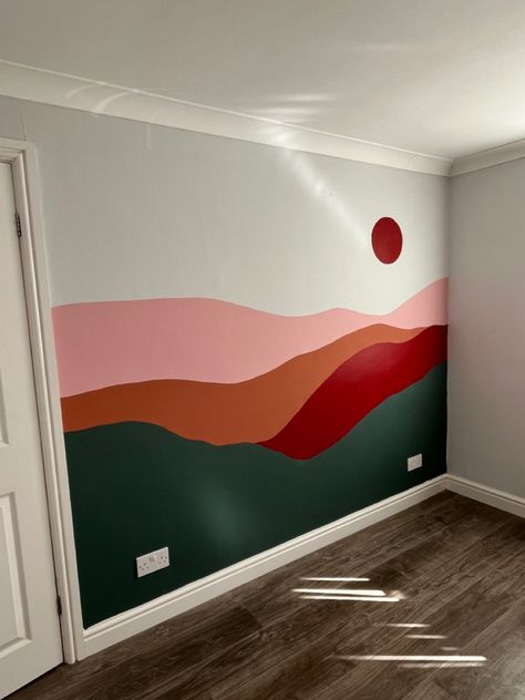 Bedroom feature wall mural of a sunset and mountains Diy Feature Wall Paint Bedroom, Wall Mural Mountains Diy, Simple Mountain Mural Nursery, Sunset Bedroom Walls, Painted Mountain Wall Mural, Bedroom Mountain Mural, Calming Mural Ideas, Mountain Sunset Wall Mural, Wall Murals For Home