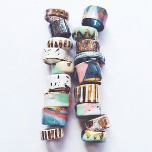 Ruby Pilven | ceramic rings Ceramics Rings, Porcelain Rings, Bangle Collection, Magic Rings, Rings Ruby, Ceramic Designs, Don Pedro, Colorful Bangles, Hippie Man