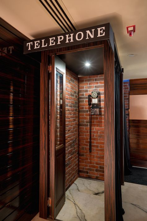 PDT HK would not have been complete without the phone booth at the entrance and… Phone Booth Door, Speakeasy Door Entrance Diy, Speakeasy Hidden Door Ideas, Secret Speakeasy Entrance, Speakeasy Secret Entrance, Speak Easy Bar Entrance, Speakeasy Entrance Doors, Speakeasy Bar Entrance, Hidden Rooms Ideas