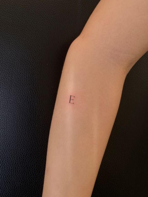 Letter E Finger Tattoo, Small Tattoos Initials, Small E Tattoo Letter, Ella Tattoo Name, E Tatoos Letter, E Letter Tattoo Design, Cursive E Tattoo, Letter E Tattoo Ideas, E Initial Tattoo