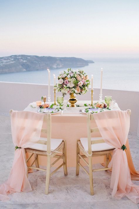 peach wedding table - photo by Julia Kaptelova http://ruffledblog.com/romantic-santorini-elopement Romantic Dinner Tables, Wedding Photo Table, Romantic Dinner Decoration, Romantic Table Setting, Decoration Evenementielle, Beach Dinner, Romantic Dinner For Two, Romantic Table, Santorini Wedding