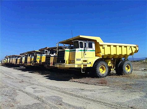 Nice fleet of PayHauler 340’s, 350B’s and 350C’s lined up waiting for work in the California sun. Note the colour scheme variations between the older IH-manufactured machines and the later Payhauler Corp models Used Construction Equipment, Earth Moving Equipment, Tractor Trailer Truck, International Harvester Truck, International Tractors, Heavy Construction Equipment, Model Trucks, Truck Cranes, Mining Equipment