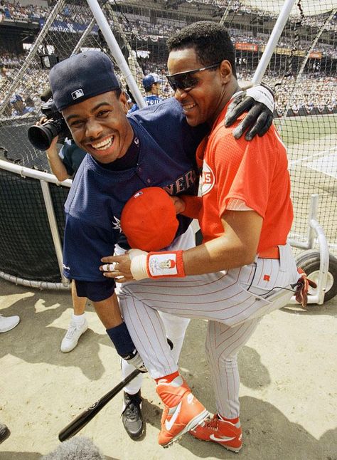 Ken Griffey, Jr. with Barry Larkin before the 1993 Home Run Derby in Baltimore, where Junior became the first - and only - person ever to hit a ball off the warehouse beyond the right field fence in the air. Seattle Mariners, Barry Larkin, Field Fence, Ken Griffey Jr, Ken Griffey Jr., Griffey Jr, Ken Griffey, The Outfield, Baseball Softball