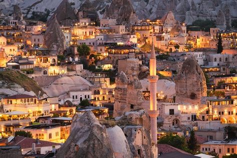 Goreme, Cappadocia, Turkey. View of the evening city from the mountain. Bright evening city. Landscape in the summertime. UNESCO heritage. Vacation and tourism. Pamukkale, Turkey Landscape, Goreme Cappadocia, Turkey Country, Cappadocia Turkey, In The Summertime, Youtube Views, City Landscape, Abstract Photos