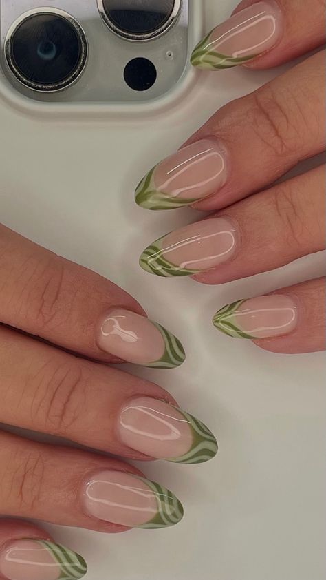 sage green nails, nail aesthetic, nail inspo, trendy nails, gelx nails, gel extensions, green nails, light green nails, zebra nails, abstract green nails, french tip nails, baddie nails, cute girl nails, clean girl nails, simple nails, nail vibes, hailey bieber nails, almond nails, short nail designs, fall nail designs, 2023 nails, tiktok nails, fun nails, nail photos, nail aesthetic, green aesthetic, deep v cut french nails , nails of the day, nail boards Nail Extensions Almond Shape, Sage Green Nails Aesthetic, Almond Nails Designs Green, Light Green Almond Nails, Cute Sage Green Nails, Light Green Nail Ideas, Light Green Nails Designs, Natural Gel Nails Ideas, Abstract French Tip Nails