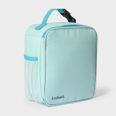 Carry your lunch in style with the Cube Classic Molded Lunch Bag from Embark™️. Designed in a cube shape, this mint green lunch bag features a main compartment with inner mesh pocket to help keep spoons, napkins and other items separate, while the exterior water bottle pocket helps you stay hydrated. This classic molded lunch. bag comes with an adjustable top handle for convenient carrying to the office, school and more. Embark™: Find Wonder As You Wander Preppy Water Bottle, School Wishlist, Lunch Box Set, Cube Shape, Back To School Essentials, Lunch Box Bag, Dream School, Cute Preppy Outfits, School Essentials