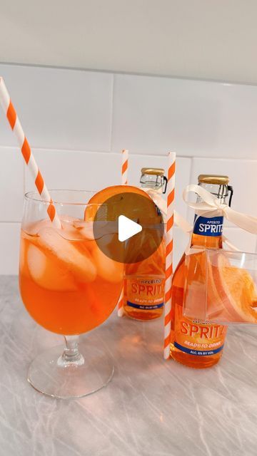 Rêve x Rae │ Erin Rae on Instagram: "POV. You find the cutest ready to drink spritz bottles for all your summer hosting🧡  Trader Joe’s makes mini aperol ready to drink spritz bottles. They are $7.00 for the three mini bottles and taste great 🧡  This DIY would be great for dinner parties, wedding favors or bachelorette gifts!   Orange slices are also from Trader Joe’s 🍊  ⬇️ Save for later!  Follow @revexrae for more summer DIY ideas! 🧡🤍  . . . . . . . . #aperolspritz #traderjoesfinds #summervibes #cocktails #diys #dreamy #hosting #beverage"