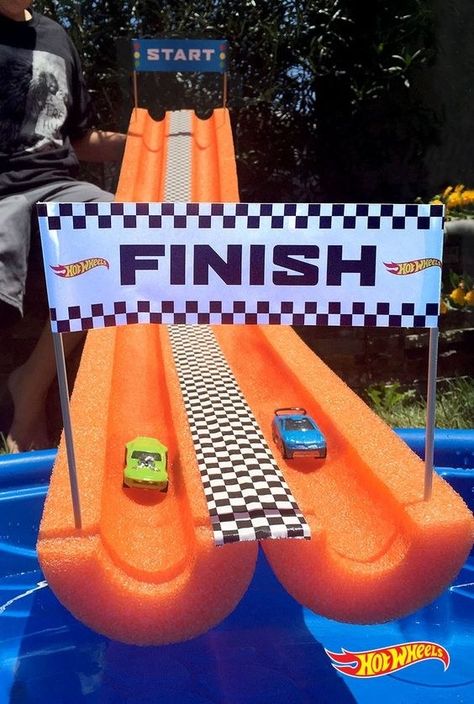 This super fun way to race Hot Wheels while the weather is still good. | 21… Festa Monster Truck, Auto Party, Hotwheels Birthday Party, Festa Hot Wheels, Hot Wheels Birthday, Hot Wheels Party, Monster Truck Party, Race Car Birthday Party, Monster Trucks Birthday Party