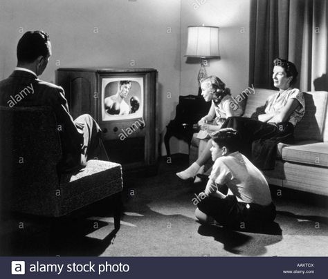 1950s FAMILY IN LIVING ROOM WATCHING TELEVISION Stock Photo 50s Family, 1950s Family, Life In The 1950s, Father Knows Best, Nuclear Family, Leave It To Beaver, Century Sofa, Big Tv, Movie Scripts