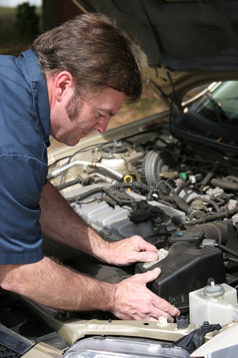 Auto Mechanic Working. An auto mechanic working on a car , #AFFILIATE, #Working, #Mechanic, #Auto, #auto, #car #ad Car On The Road, Car Image, Auto Mechanic, Car Mechanic, Auto Car, On The Road, A Car, Art Tutorials, Free Stock Photos