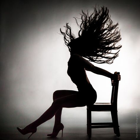 Shannon Watson - Silhouette or girl slinging hair while sitting in a chair. Burlesque Chair Poses, Chair Dance Photography, Chair Dance Pose, Chair Poses Women, Woman Sitting Pose, Posing On Chair, Silhouette Photoshoot, Silhouette Poses, Chair Dancing
