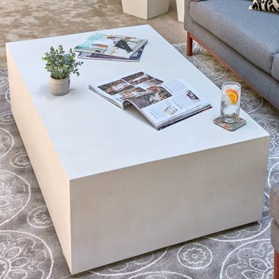 White Coffee Table Living Room, Coffee Table Stone, Block Coffee Table, Table Stone, Drum Coffee Table, Stone Coffee Table, Living Room Tv Unit Designs, Stone Concrete, Coffee Table Rectangle