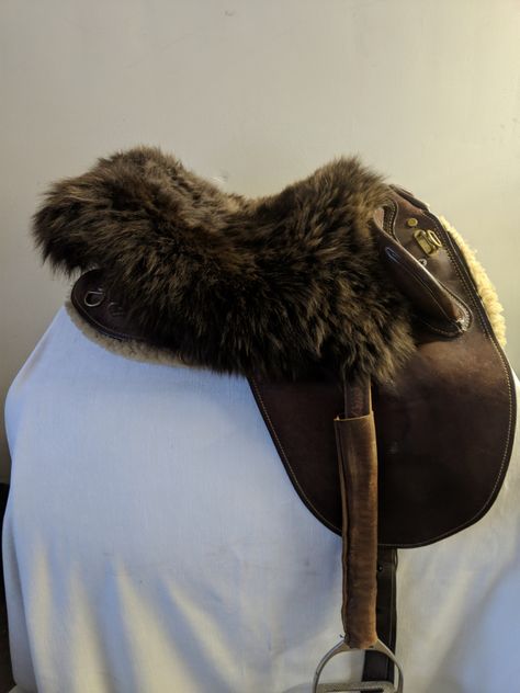 Loads of warmth and comfort in these Australian Sheepskin Saddle Seat Covers. Genuine Australian Sheepskin, thick and soft. Ties in the front and strap to go over the back or underneath the saddle to keep in place. Will fit most types of saddles. Australian Saddle, Western Horse Saddles, Saddle Cover, Saddle Seat, Bad Dog, Western Horse, Game 3, Horse Saddles, Saddle Pads