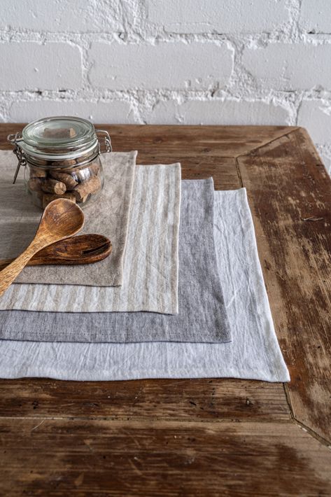 Create an elegant tablescape using our linen placemats!Linen placemats are easy to care for, they look great when serving food, and protect your table from damage. Available in multiple colors so you could easily mix and match them with linen tablecloth, linen napkins, or a table runner.One size 14"x18" (35cm x 45cm).Custom orders are available under the request.Density: 190 g/m2PRODUCT LEAD TIMEFABRIC SAMPLES Tela, Placemats For Dining Table, Sewn Placemats, Placemat Photography, Napkin Photography, Linen Drapery Panels, Linen Placemat, Linen Tableware, Linen Couch