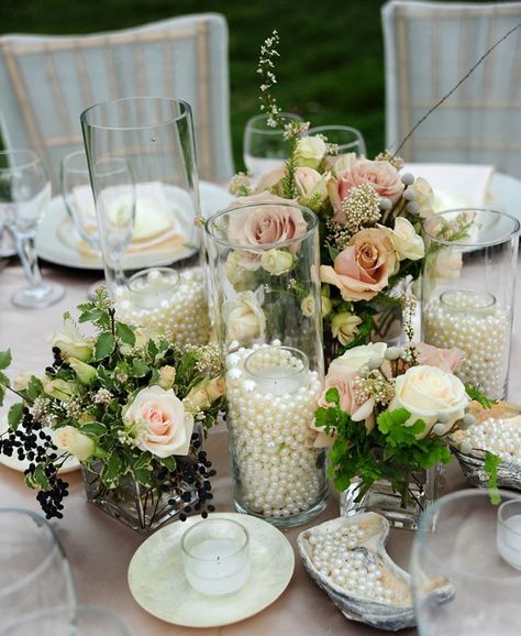 Glass cylinders filled with pearls surrounding glass votive holder and candle. Vintage Wedding Centerpieces, Pearl Centerpiece, Vintage Wedding Table, Cheap Wedding Venues, 30th Wedding Anniversary, Unique Wedding Flowers, Vintage Wedding Decorations, Wedding Table Decorations, Diy Centerpieces