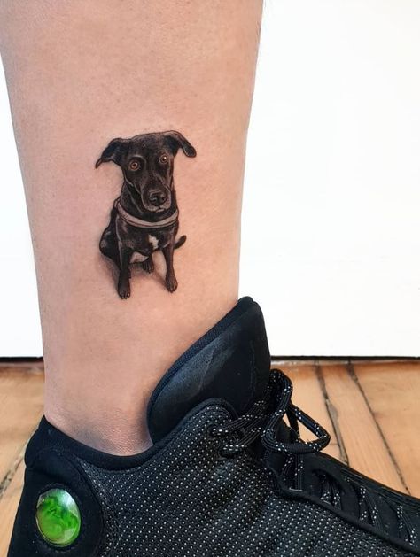 Black Dog Tattoo - TattManiaTattMania Black Dog Tattoo, Creative Small Tattoos, Tatoo Dog, Tattoos Inspo, Bright Tattoos, Dog Paw Tattoo, Paw Tattoo, Leg Tattoo Men, Cool Small Tattoos