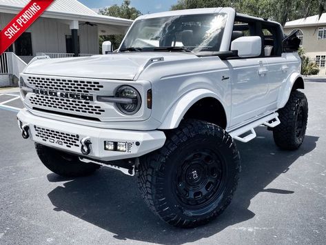 2023 Ford Bronco V6 WHITEOUT BAYSHORE CUSTOM LIFTED LEATHER BRONCO | @city Florida 2023 Ford Bronco Heritage, Ford Bronco Customized, White Ford Bronco Aesthetic, Ford Bronco Aesthetic, White Ford Bronco, Lifted Bronco, 2022 Bronco, Ford Bronco Outer Banks, Ford Bronco Lifted